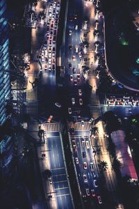 Illuminated buildings in city at night