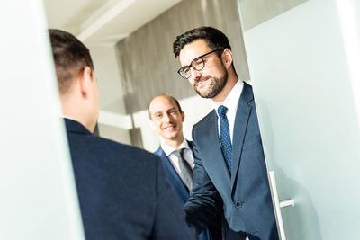 Portrait of businessman working at office