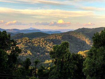 Scenic view of mountains against sky during sunset