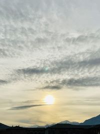Low angle view of mountains against sky during sunset