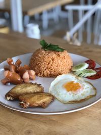 Close-up of breakfast served on table