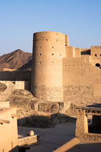 View of old ruins against clear sky