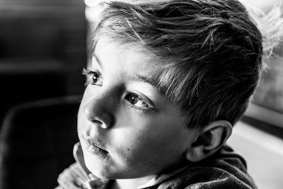 Close-up portrait of boy looking away