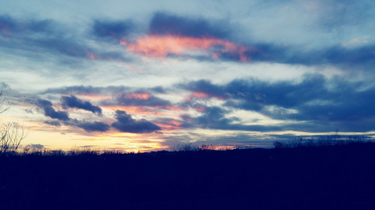 sunset, sky, silhouette, landscape, scenics, cloud - sky, tranquil scene, beauty in nature, tranquility, field, nature, cloud, dramatic sky, cloudy, orange color, idyllic, dusk, outdoors, weather, no people