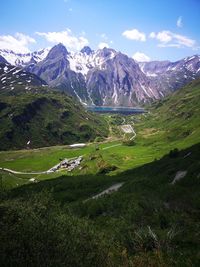 Scenic view of snowcapped mountains against sky