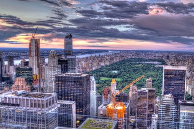 Aerial view of city at sunset