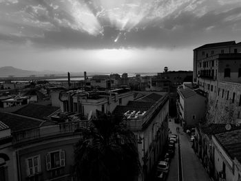 High angle view of buildings in city against sky