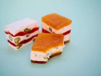 Close-up of dessert served on white background