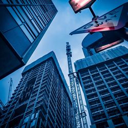 Low angle view of modern building against sky