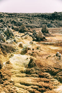 Scenic view of rocky landscape against sky