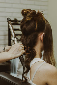 Portrait of a young girl at the hairdresser.