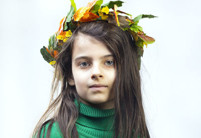 Portrait of a girl 7 years old on a white background