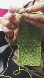 Female hands knitting