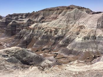 Scenic view of rock formations in desert against sky