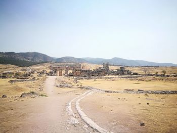 Scenic view of desert against clear sky