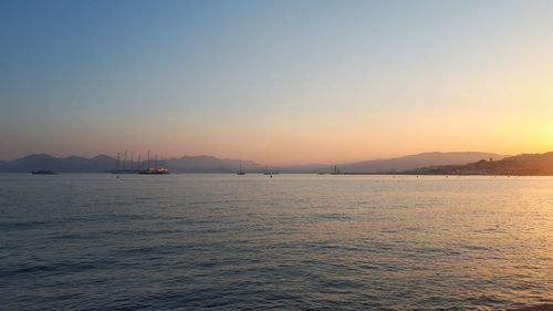 Scenic view of sea against sky during sunset