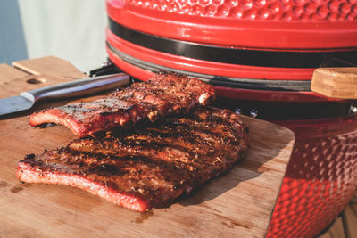 High angle view of meat on barbecue grill