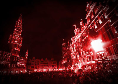 Low angle view of illuminated building at night