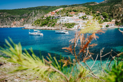 Scenic view of sea and buildings