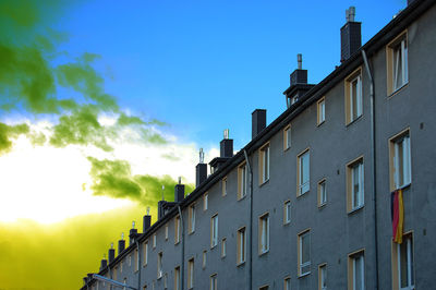 Low angle view of building against blue sky