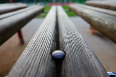 Close-up of wooden surface level of railing