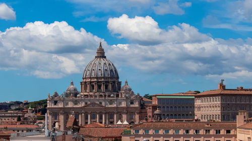 View over the rooftops of rome to st. peter's basilica