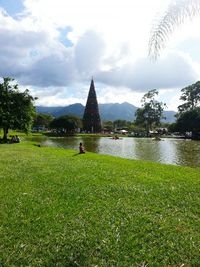 View of lake against cloudy sky