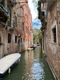 View of buildings along a canal in venice