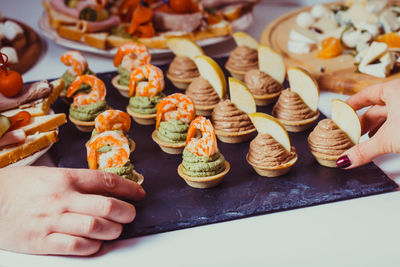 Close-up of person holding food