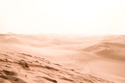 Scenic view of desert against clear sky