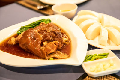 Close-up of food served on table