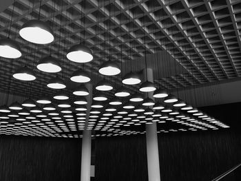 Low angle view of illuminated ceiling