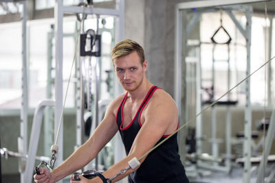 Man exercising in gym