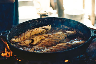 Close-up of meat in cooking pan