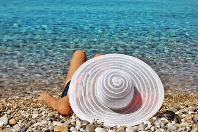 Woman sunbathing at beach