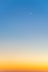 Low angle view of moon in sky