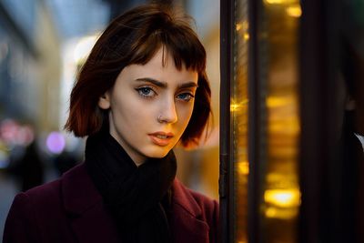 Portrait of young woman looking away