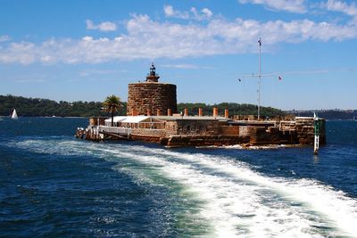 View of sea with buildings in background