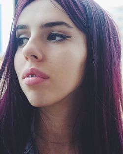 Close-up portrait of young woman