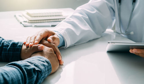 Doctor encouraging patient