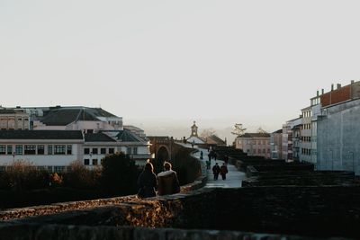 Woman standing in city