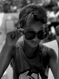 Portrait of young boy wearing sunglasses