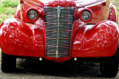 Close-up of red vintage car