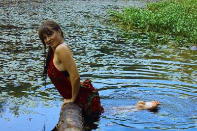 Woman standing in water