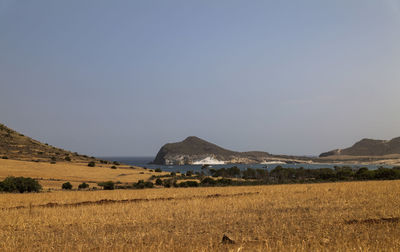 Scenic view of landscape in cabo de gata nature park, spain, against clear sky in summer