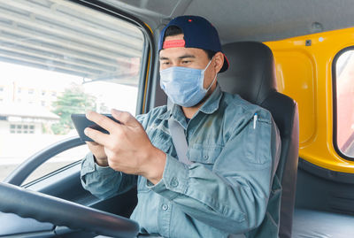 Man sitting in bus