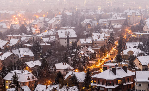 High angle view of buildings in city during winter