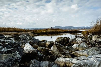 Scenic view of rocks against sky