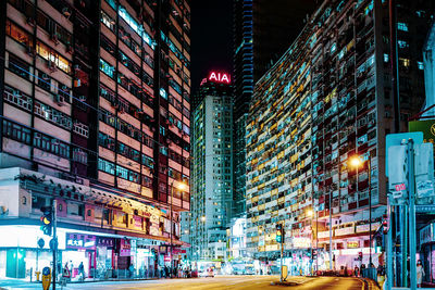 Illuminated buildings in city at night