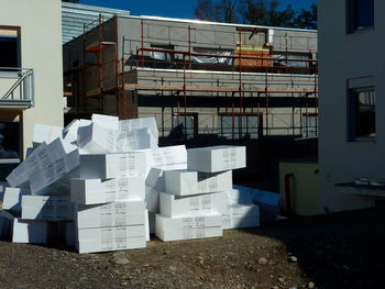 Stack of building by construction site